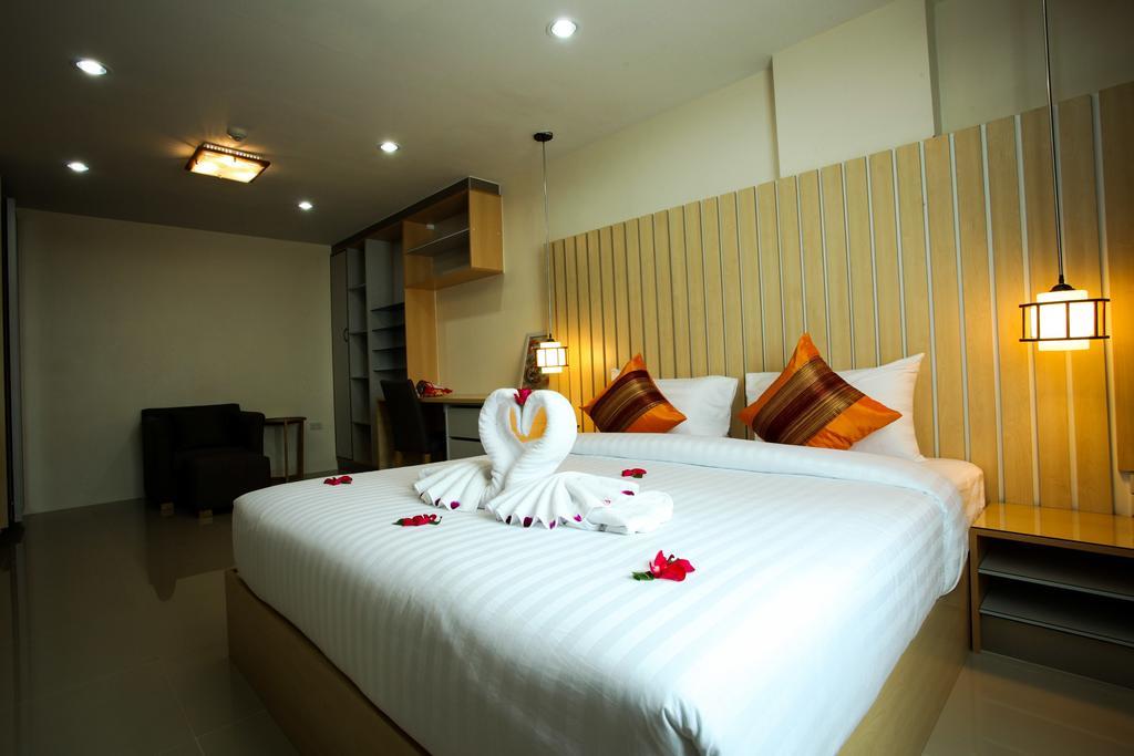 Patt Apartamentos con servicio Chonburi Habitación foto