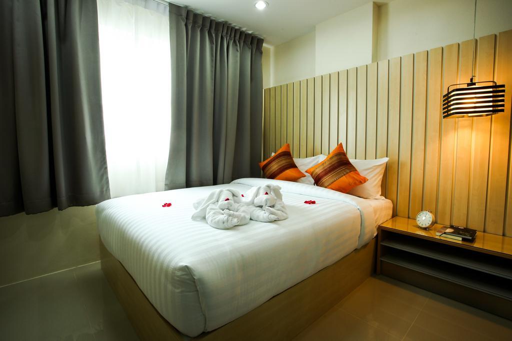 Patt Apartamentos con servicio Chonburi Habitación foto